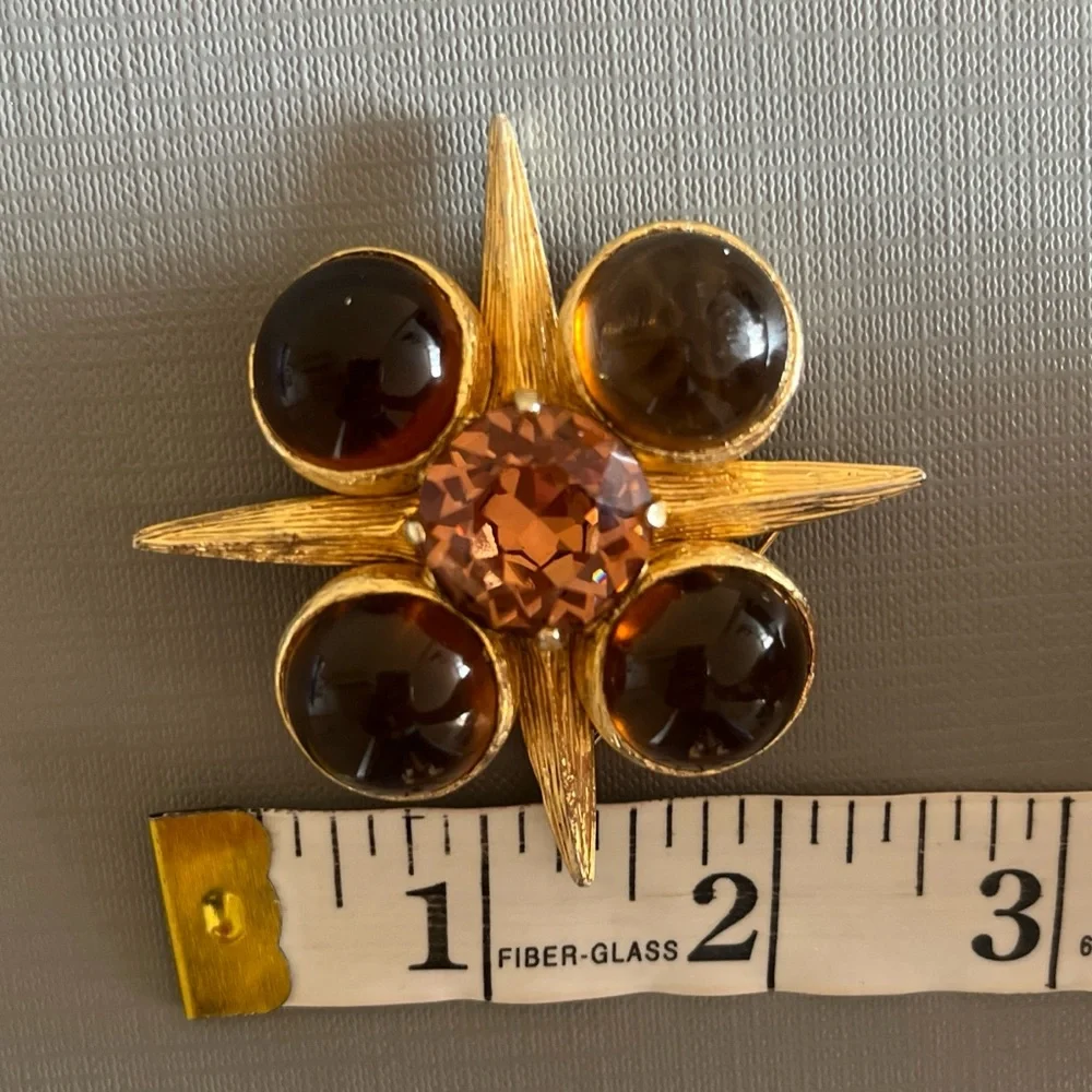 Vintage Benedikt NY Maltese cross brooch, with faceted amber glass stones .